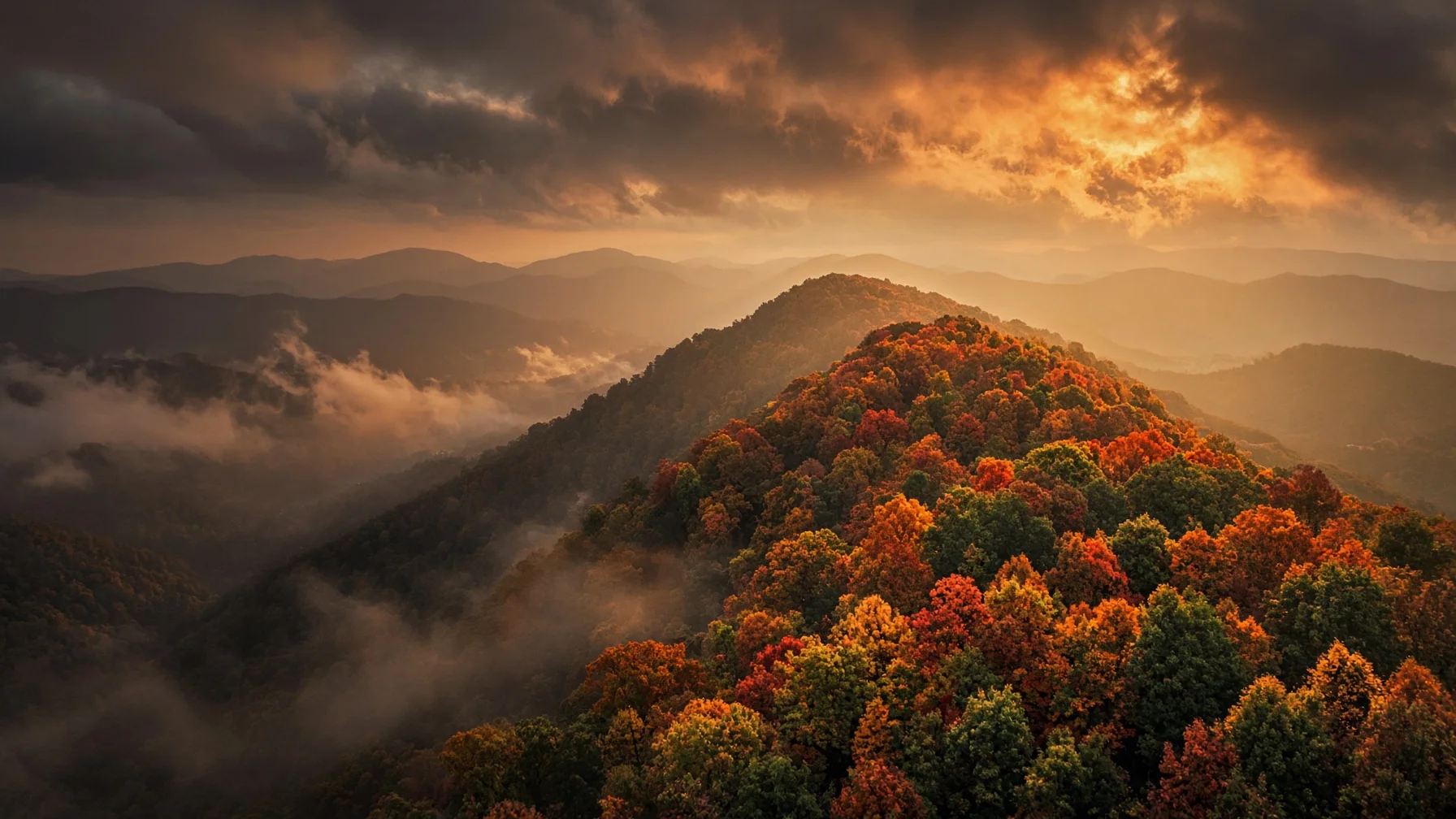 Aerial view of fall foliage across a mountain ridge in Alabama